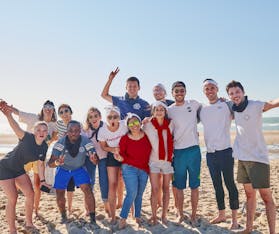 pic of the teams on the beach